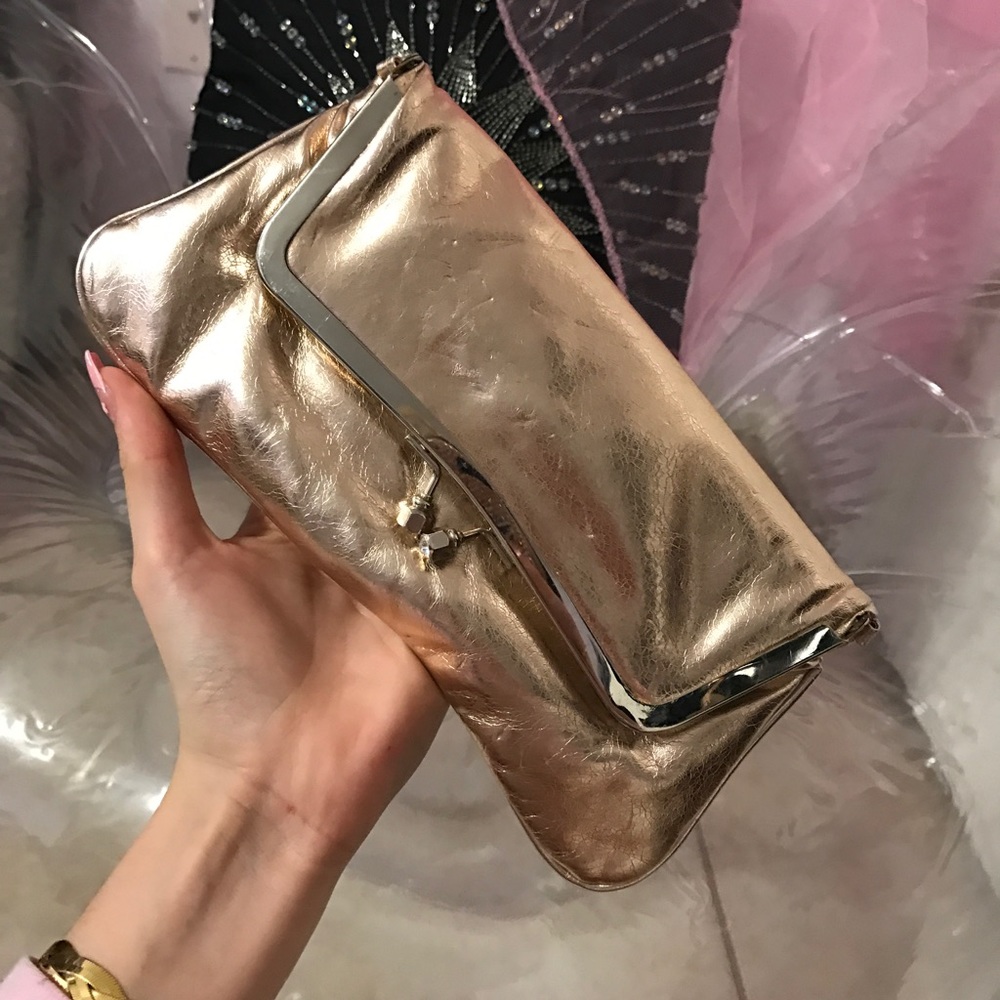 Super cute rose gold metallic clutch!